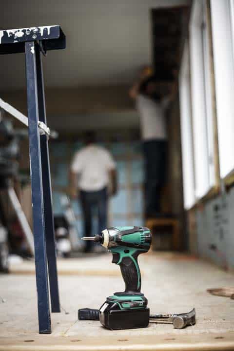 Battery drill on the floor — the kind of handyman work vetted local pros handle in Sarasota, FL