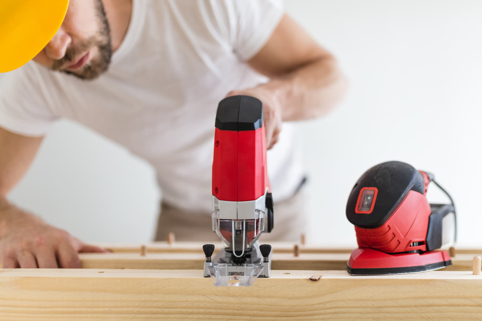 Male carpenter working on a project — the kind of handyman work vetted local pros handle in Sarasota, FL