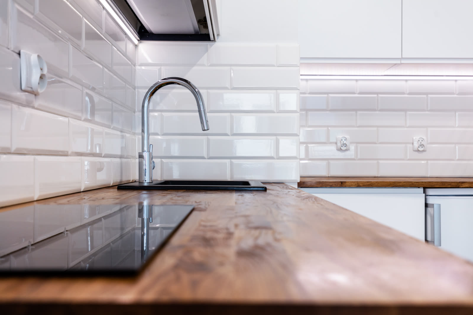 New clean kitchen with wooden table top — the kind of handyman work vetted local pros handle in Sarasota, FL