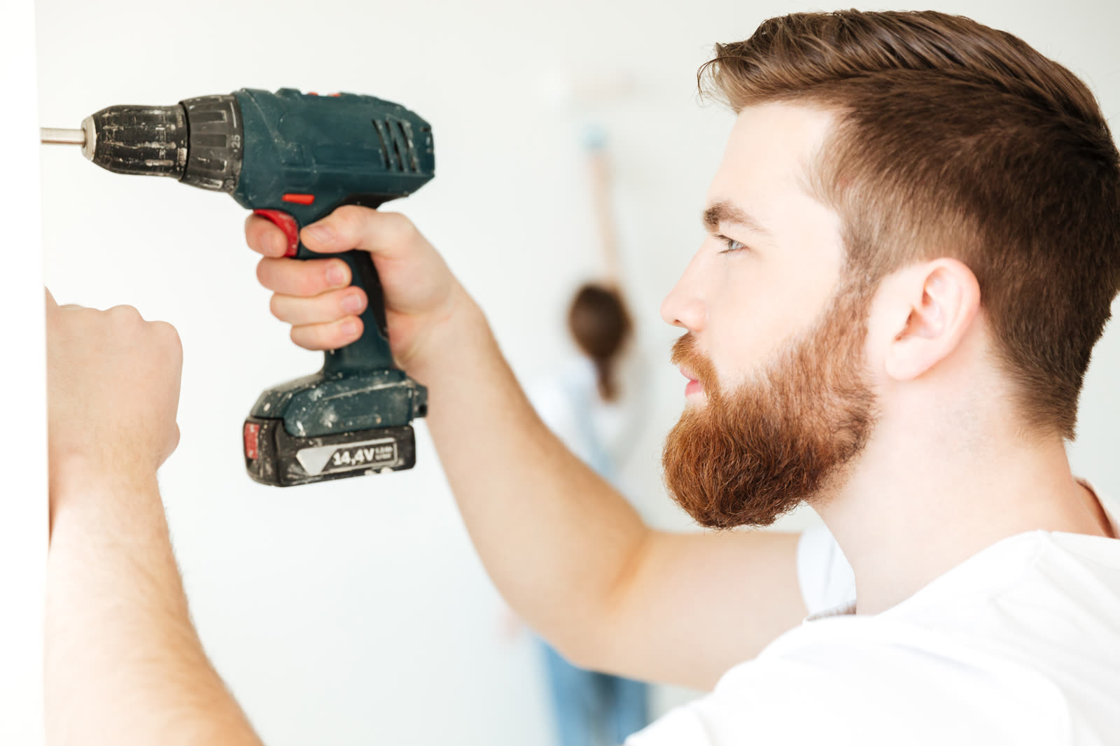 Portrait of man making repair isolated — the kind of handyman work vetted local pros handle in Sarasota, FL