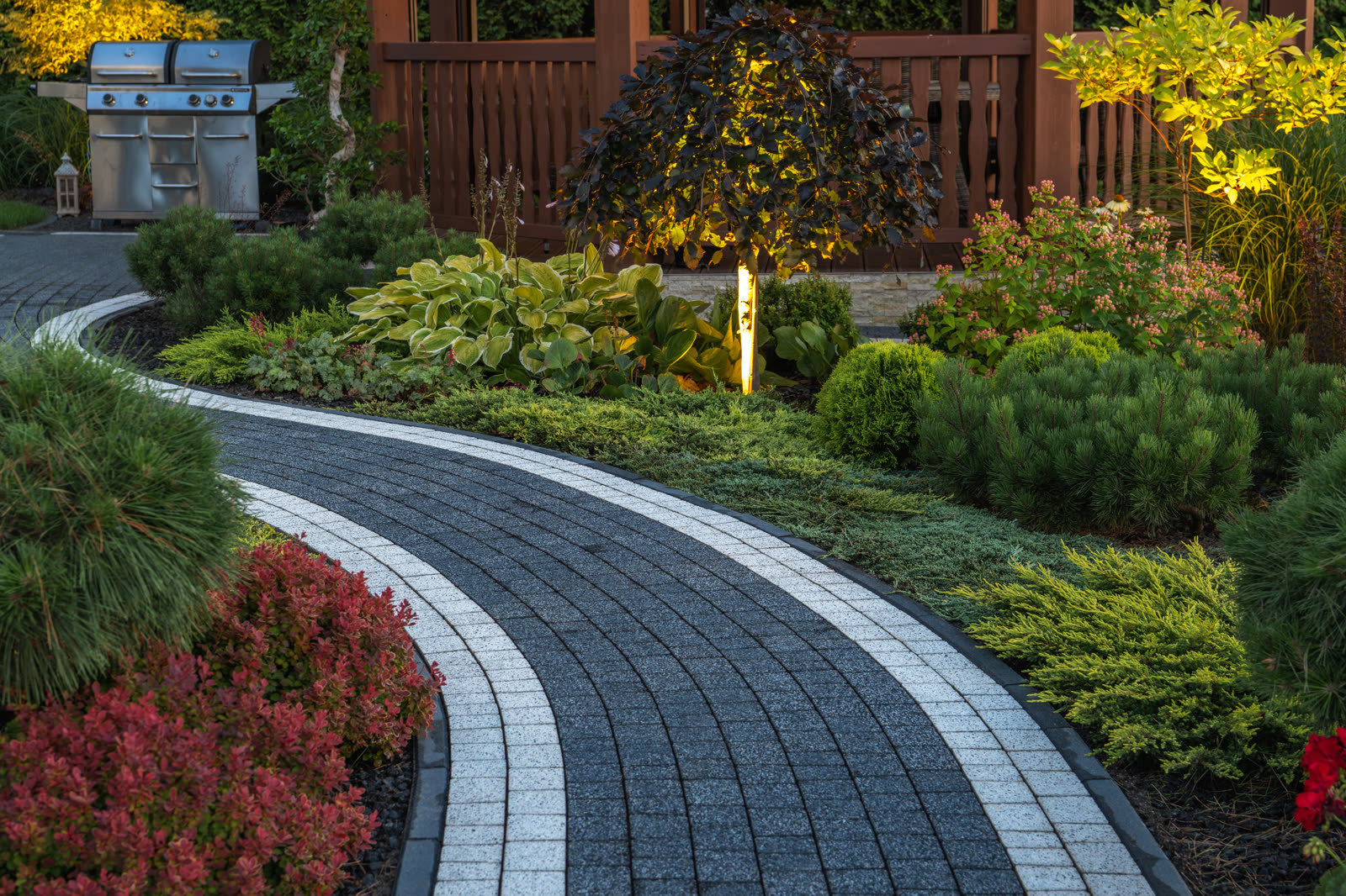 Curving paver garden path with clean joints