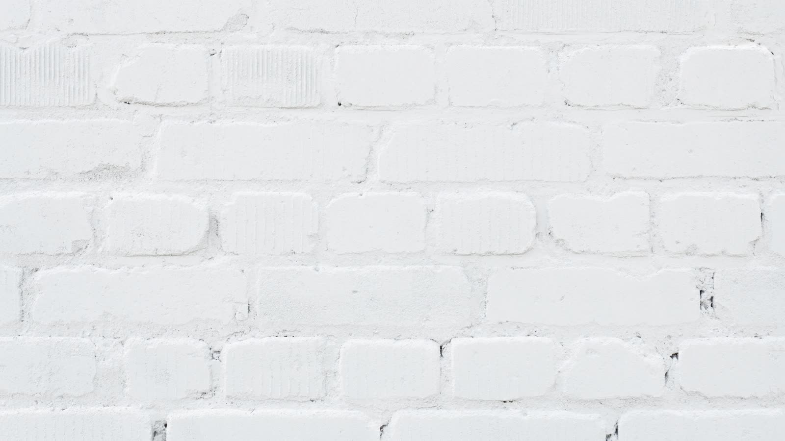 Old brick wall painted white or whitewashed backgr — the kind of handyman work vetted local pros handle in Sarasota, FL
