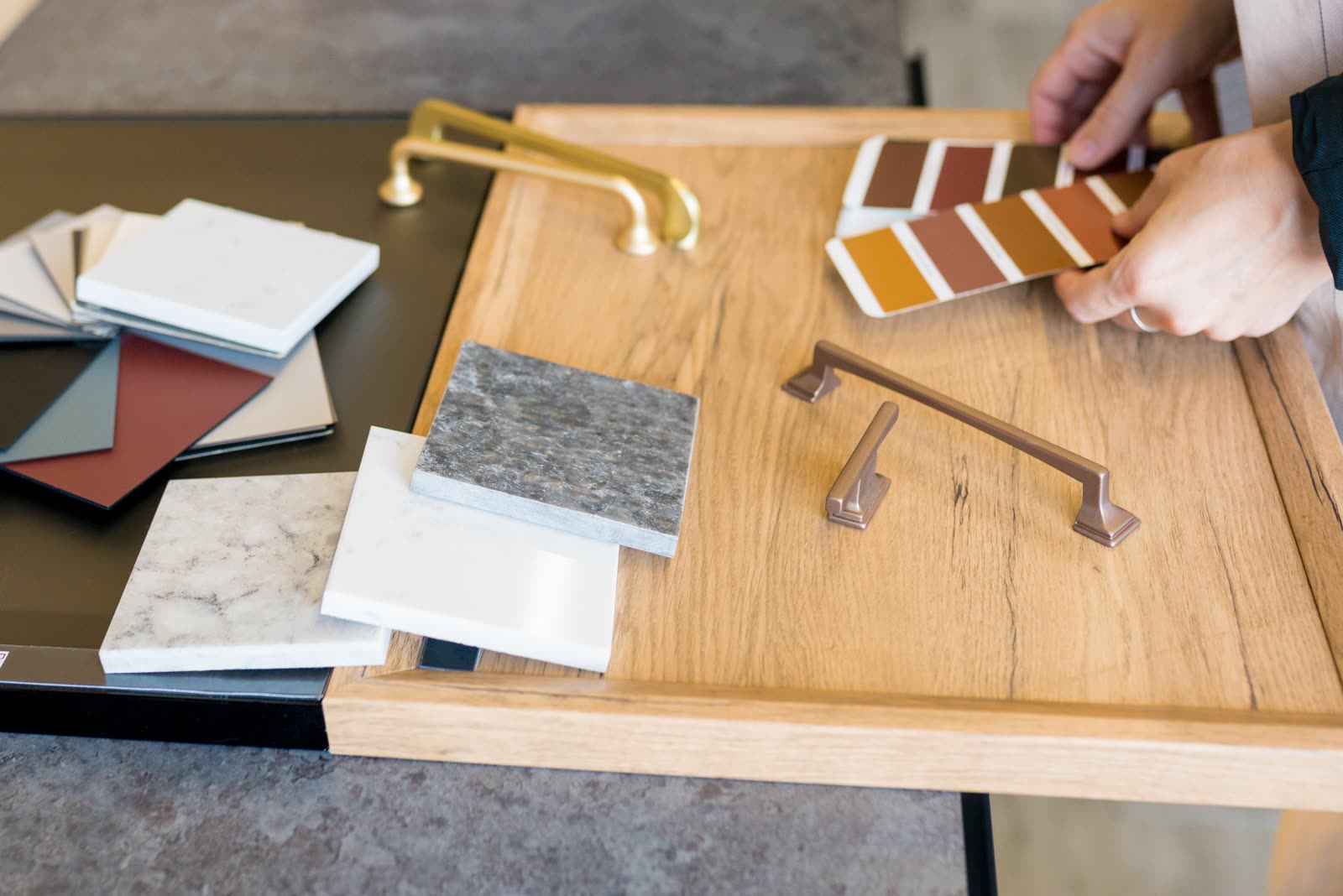 Designer woman choosing details of new kitchen in — the kind of handyman work vetted local pros handle in Sarasota, FL
