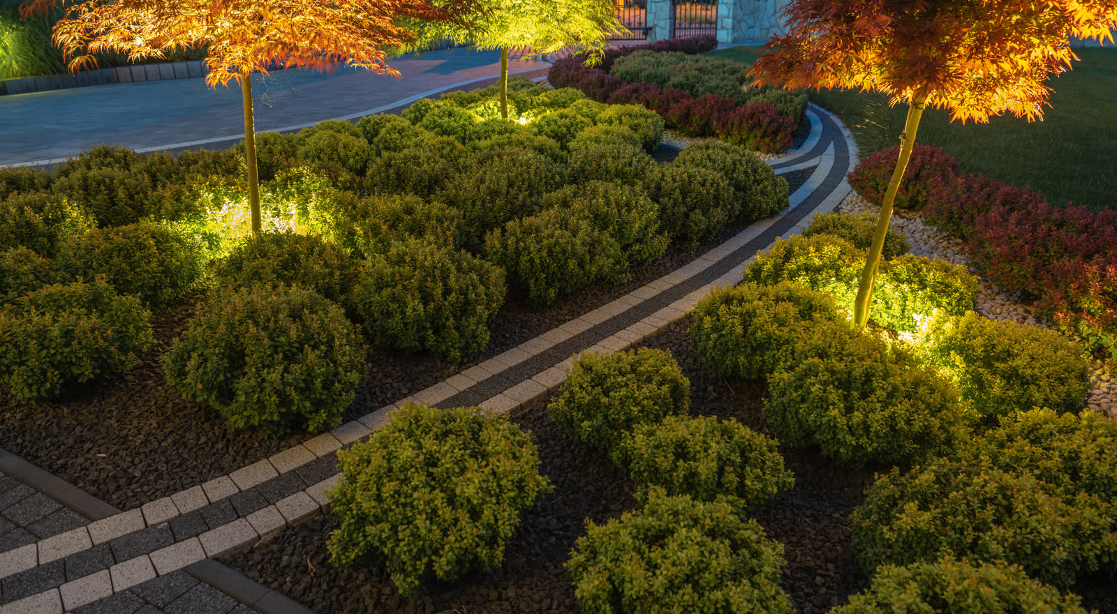 Low-voltage path lighting at dusk — the kind of work our vetted local pros handle in Sarasota, FL