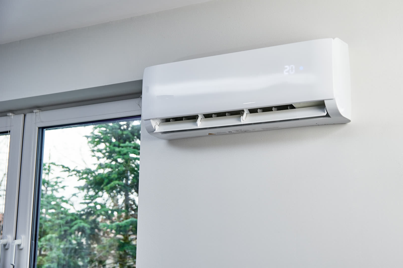 Air conditioner hanging on the wall close up — the kind of handyman work vetted local pros handle in Sarasota, FL